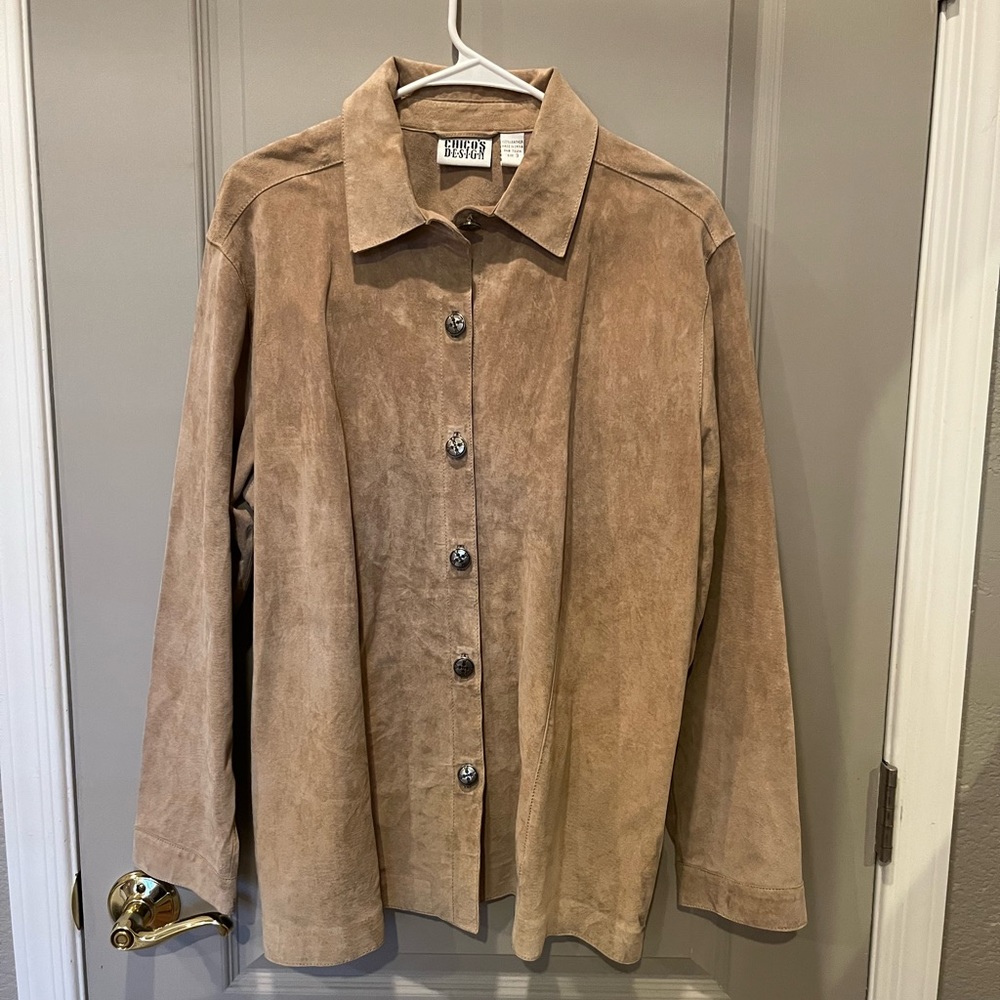For the ladies, a Chico’s Design brushed leather shirt/jacket, size 3.